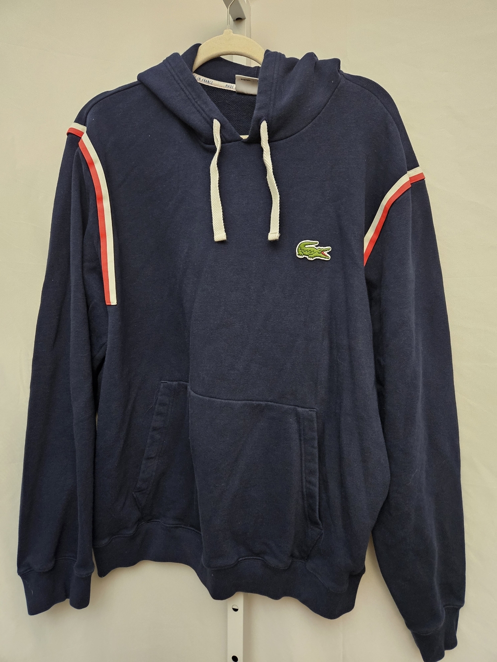 Lacoste Navy Pullover Hoodie with Red and White Shoulder Stripes
